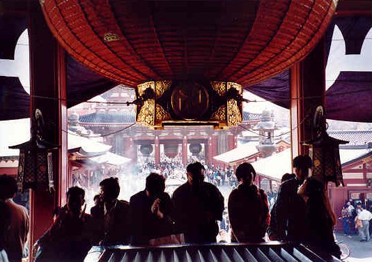 Worshippers lighting incense at the oldest buddhist temple in Japan. 